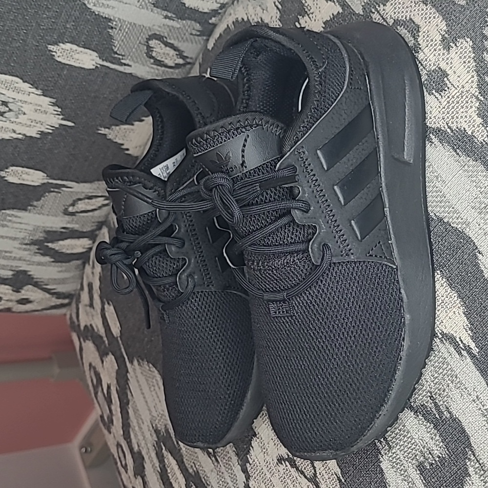 Black Adidas running sneakers